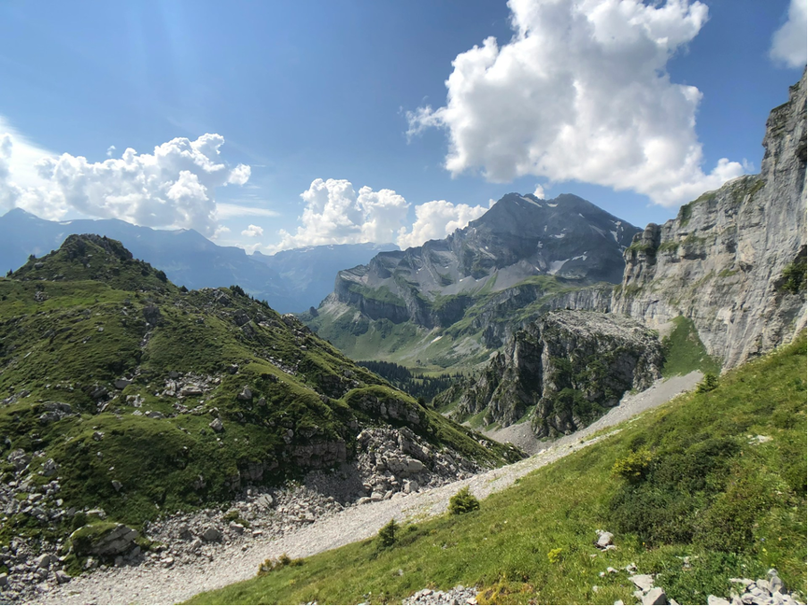 Hiking trail winding through rugged terrain in the car-free mountain resort of Braunwald, located in the canton of Glarus in Eastern Switzerland.