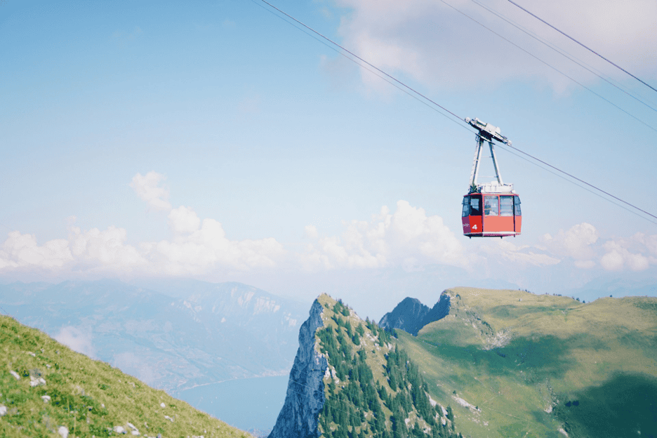 Red Stockhorn cable car ascending the mountain.