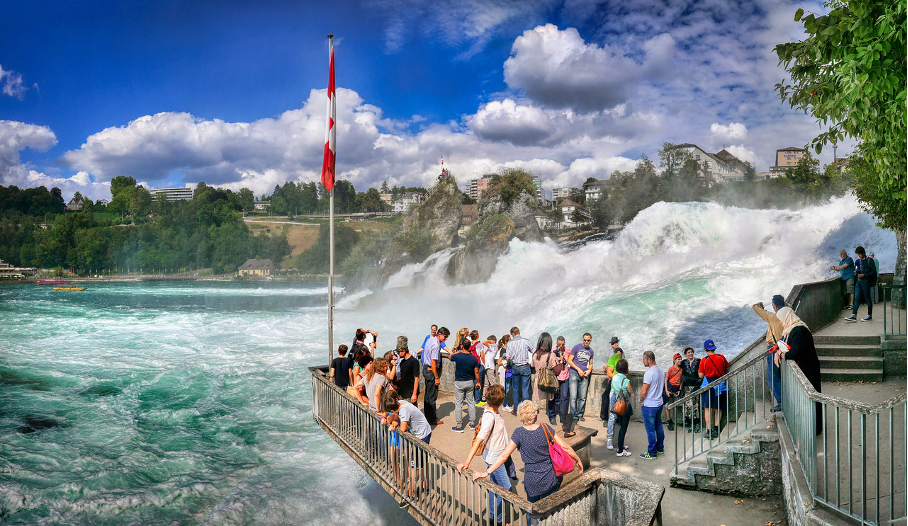 Viewing platform on the Southern Bank of the Rhine Falls at Laufen Castle, providing a breathtaking up-close perspective of the rushing waters.