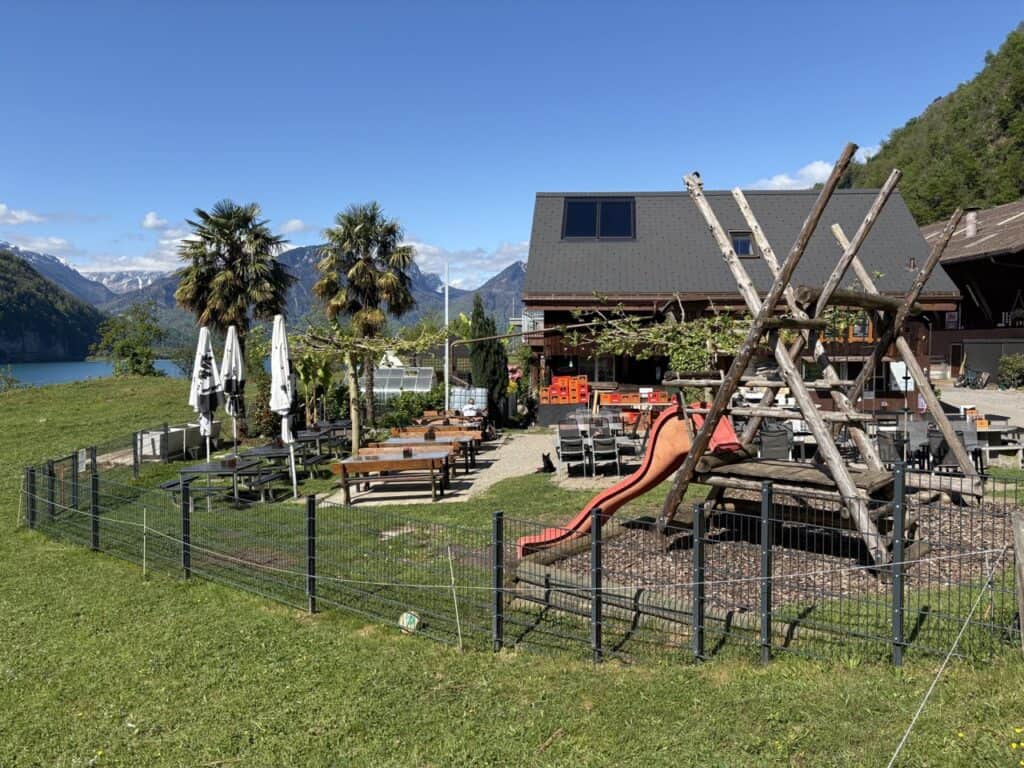 Restaurant Burg Strahlegg with outdoor seating and children’s playground.
