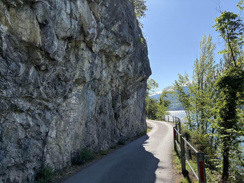 Narrow road along Lake Walensee leading from Weesen to Betlis