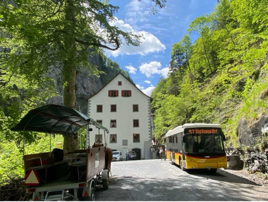 Yellow post bus shuttle that transports visitors from Bad Ragaz to Altes Bad Pfäfers/Tamina Gorge and back.
