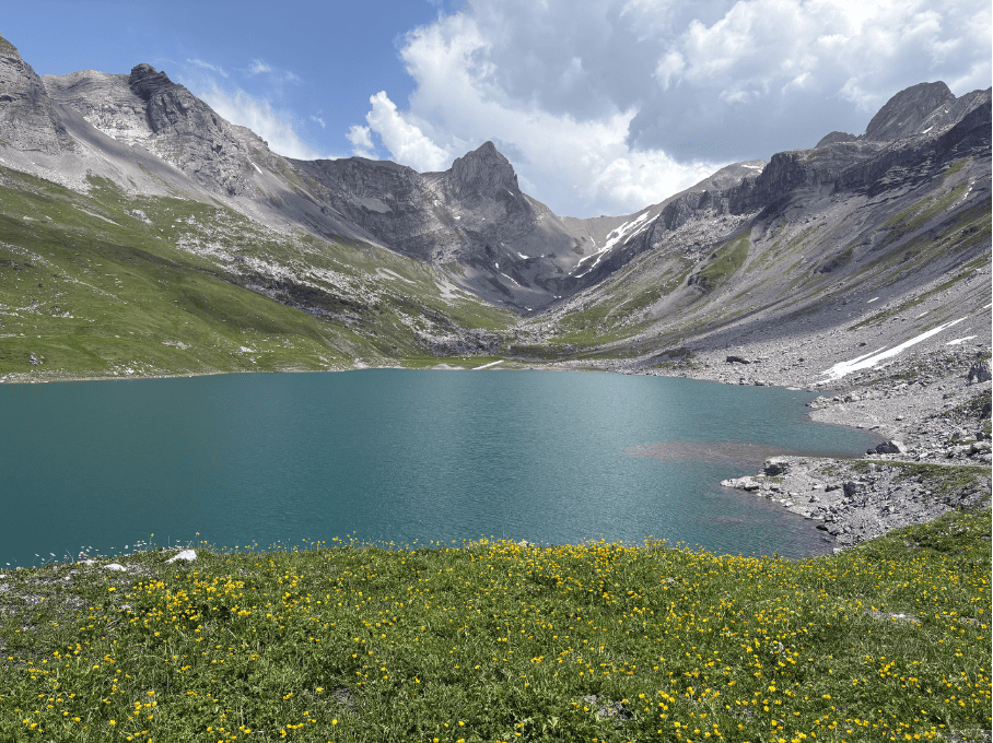 View over Glattalpsee, surrounded by mountains, a stunning hidden gem just a day trip from Zurich