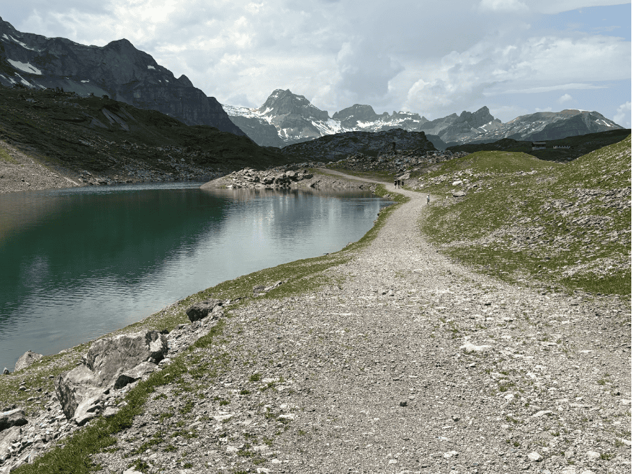 Hiking trail along Glattalpsee, Swiss mountain lake in Central Switzerland