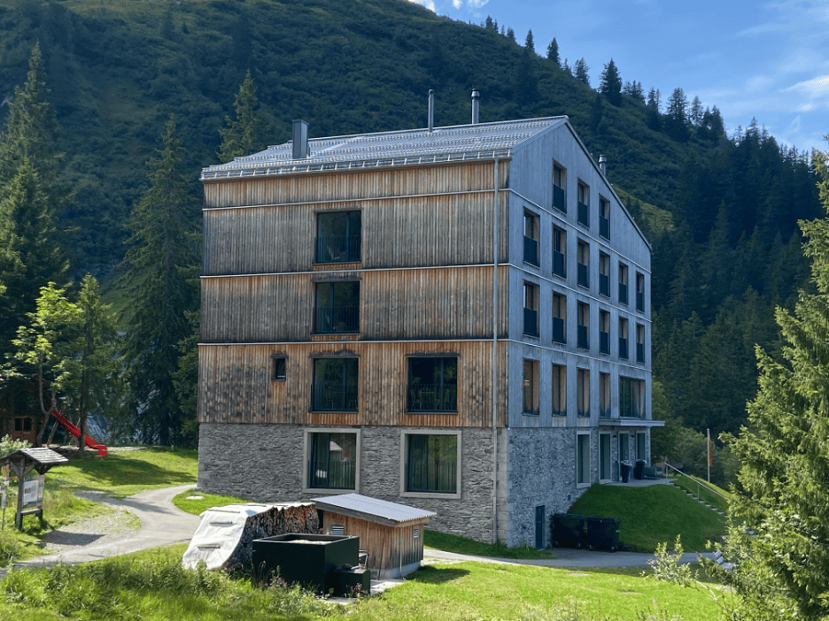 Berghotel Mettmen, modern wooden alpine house blending beautifully into Mettmenalp nature