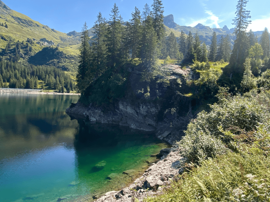 Scenic view over turquoise blue Lake Garichti on Mettmenalp