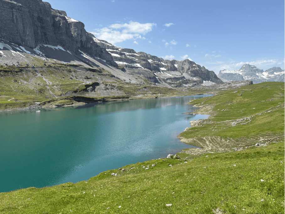 Looking out over Glattalpsee, one of the most stunning hidden gems in Switzerland — just a day trip from Zurich.