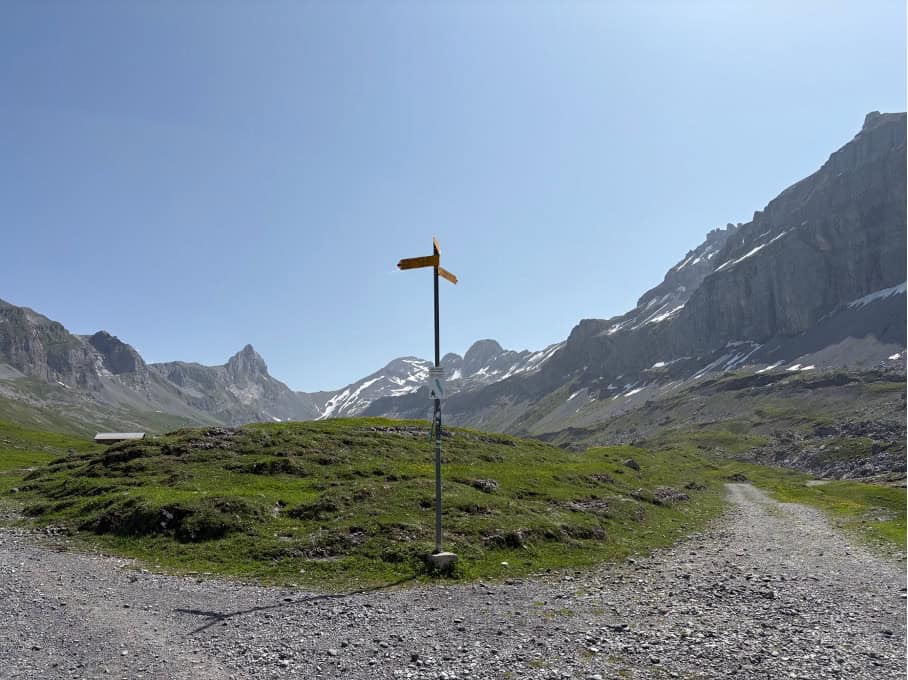 Extremely tall trail signs at Glattalp, built high for deep winter snow.