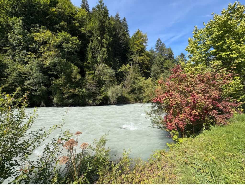 Walking path along the Kander River between Mülenen and Wimmis near Mount Niesen