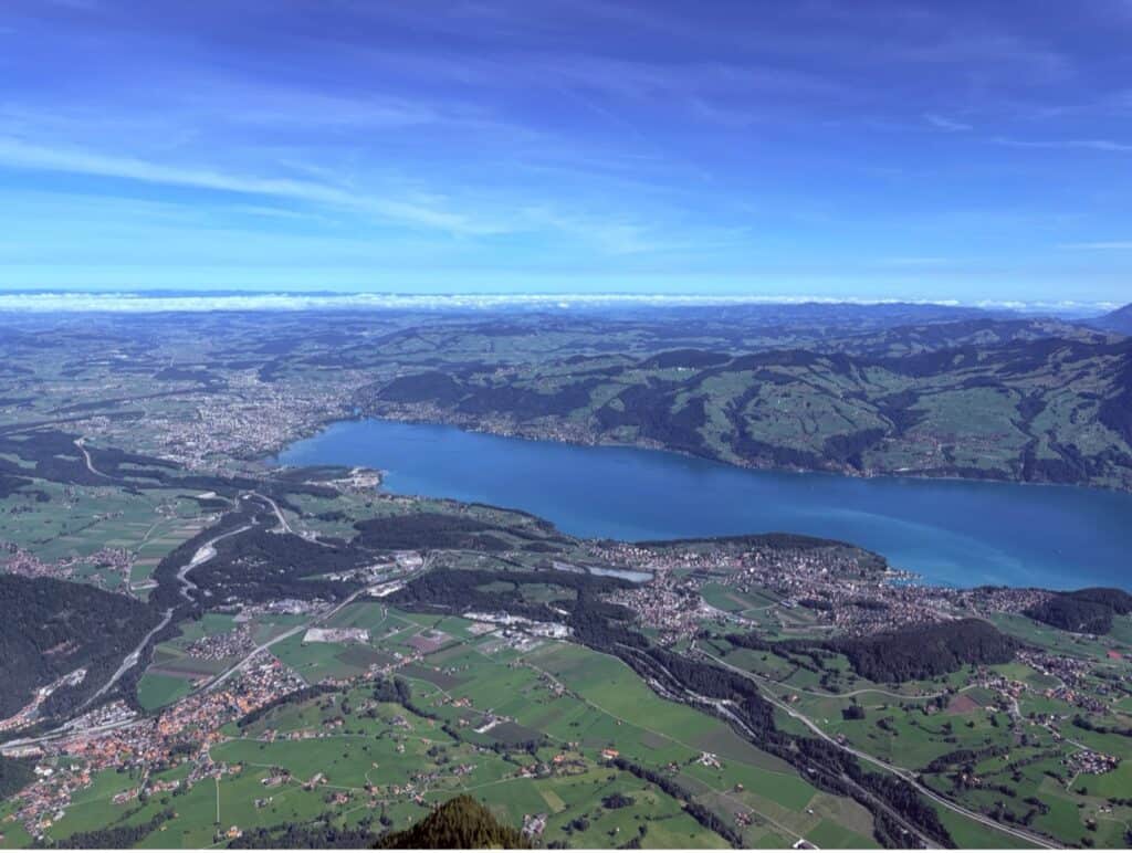 View from Mount Niesen down to the city of Thun and the deep-blue waters of Lake Thun