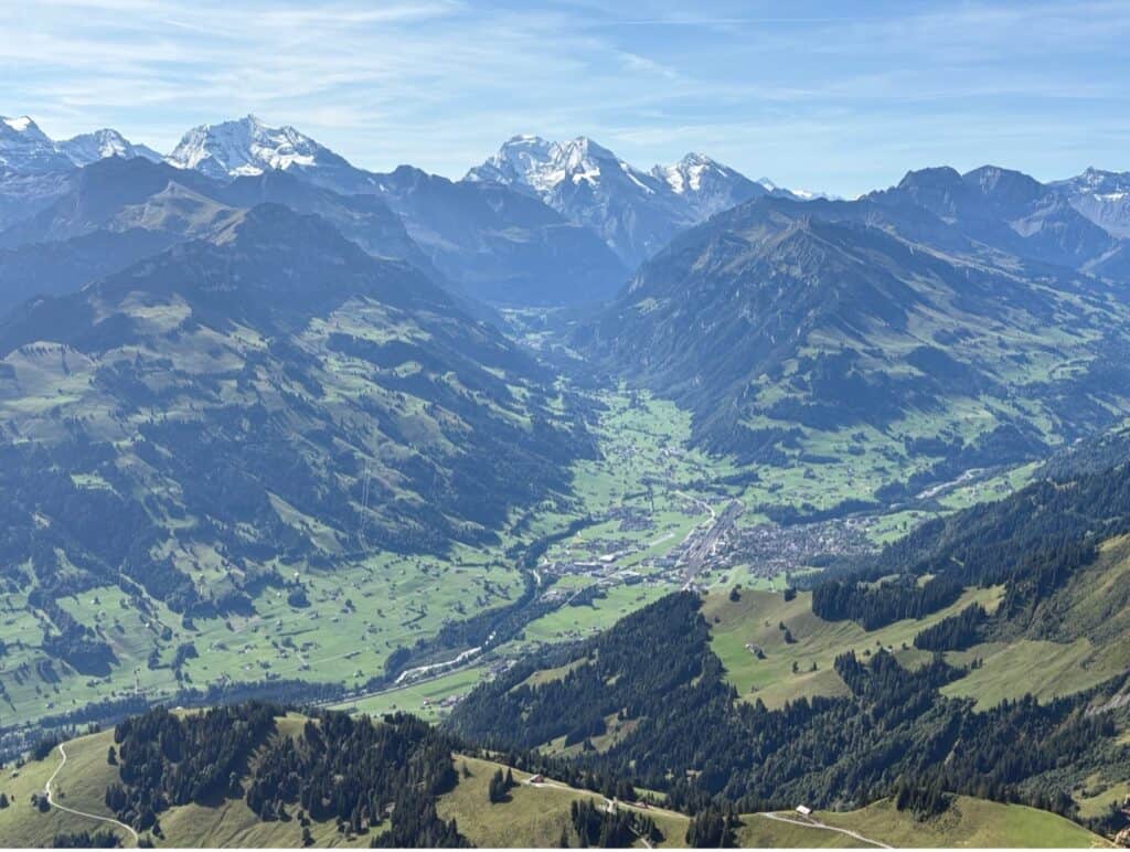 Panoramic view from Mount Niesen summit over the Diemtigtal Mountains and the valley below