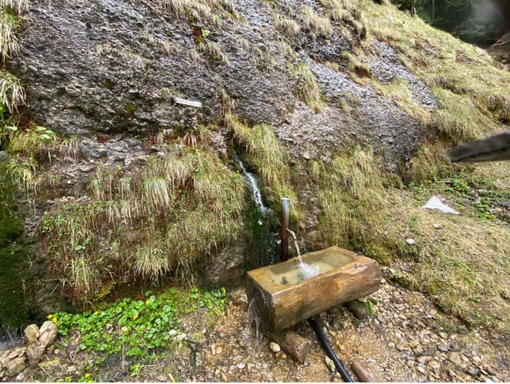 Stone fountain at the St. James Spring on Kronberg, known for its mineral-rich water