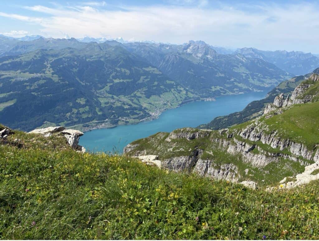 Panoramic view from Chäserrugg overlooking Lake Walen and the surrounding mountains.