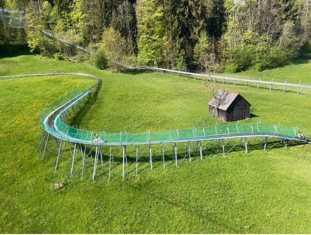 Mountain coaster ride at Kronberg offering a playful descent through alpine scenery