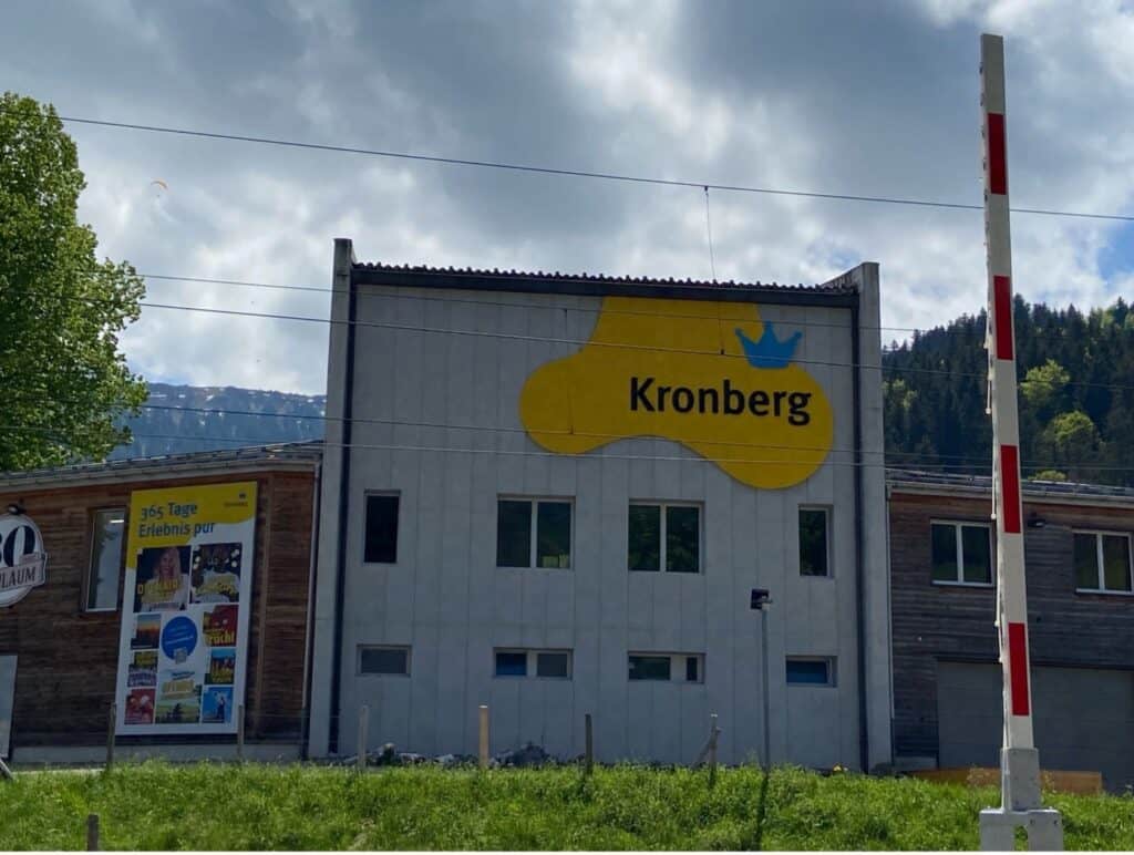 Kronberg cable car valley station in Jakobsbad, Appenzell, with train platform nearby