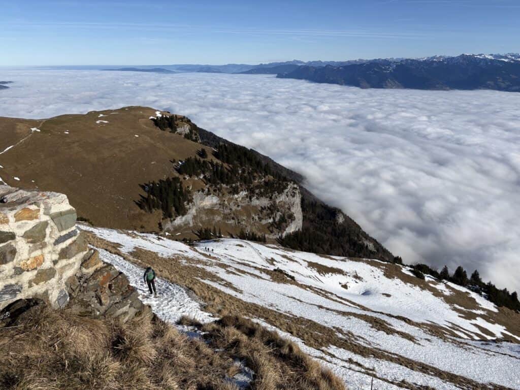 Hikers climbing the trail toward the Hoher Kasten - Top of Appenzell summit. 
