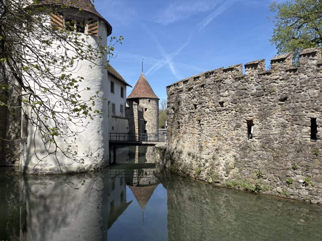 Hallwyl Castle, a historic moated castle in Switzerland , surrounded by water 