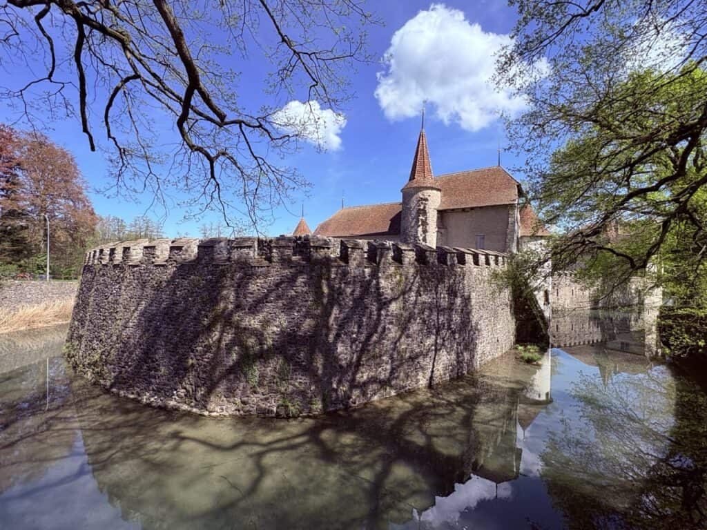 Hallwyl Castle, a historic moated castle in Switzerland near Zurich, surrounded by water.