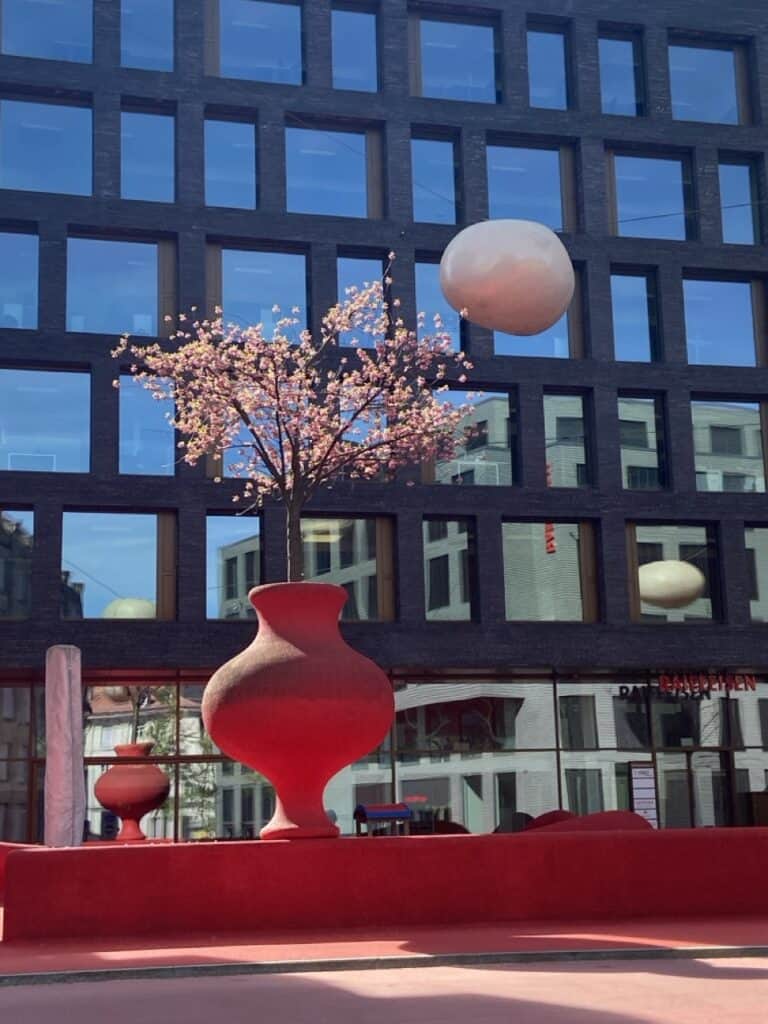 Oversized red flower vase at St. Gallen Stadtlounge