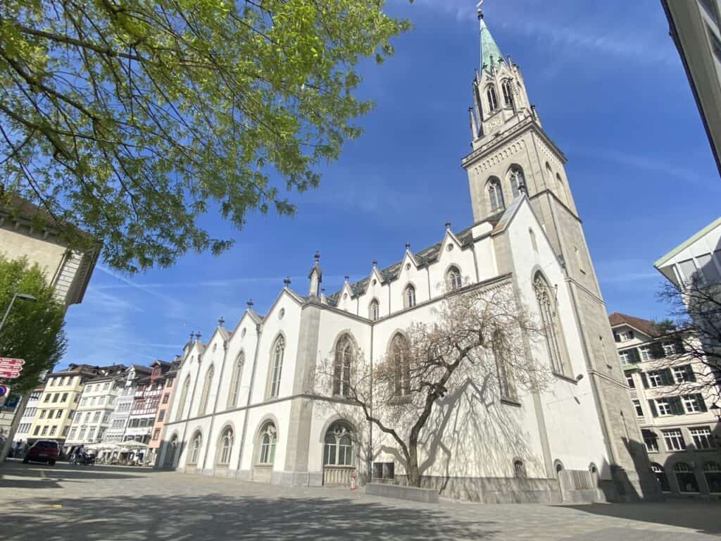 St. Laurenzen Church tower rising above rooftops in St. Gallen Old Town