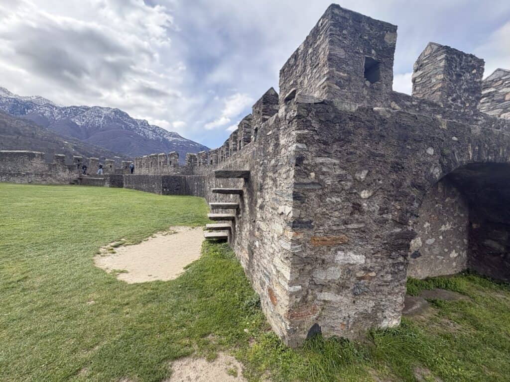 Defensive walls of Castel Grande Castle, the first stop along the Bellinzona Castles Hike.