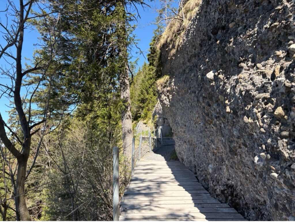 The Felsenweg Cliff Trail carved into the mountainside between Rigi Scheidegg and Rigi Kaltbad.