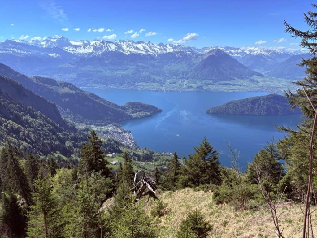 Spectacular mountain and lake view along the panoramic hiking trail between Rigi Scheidegg and Rigi Kaltbad in Switzerland.