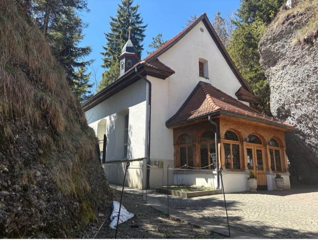 The small Rock Chapel of St. Michael in Rigi Kaltbad built into the mountainside.