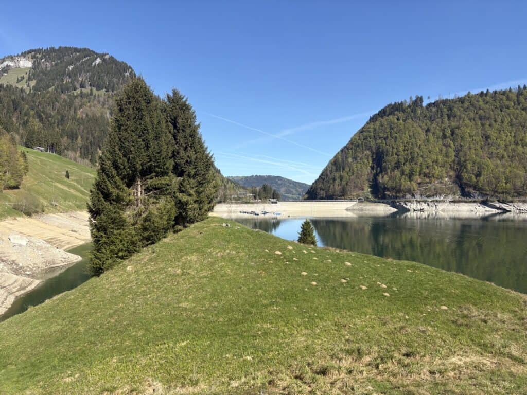 View of Wägitalersee dam while walking along the lakeshore