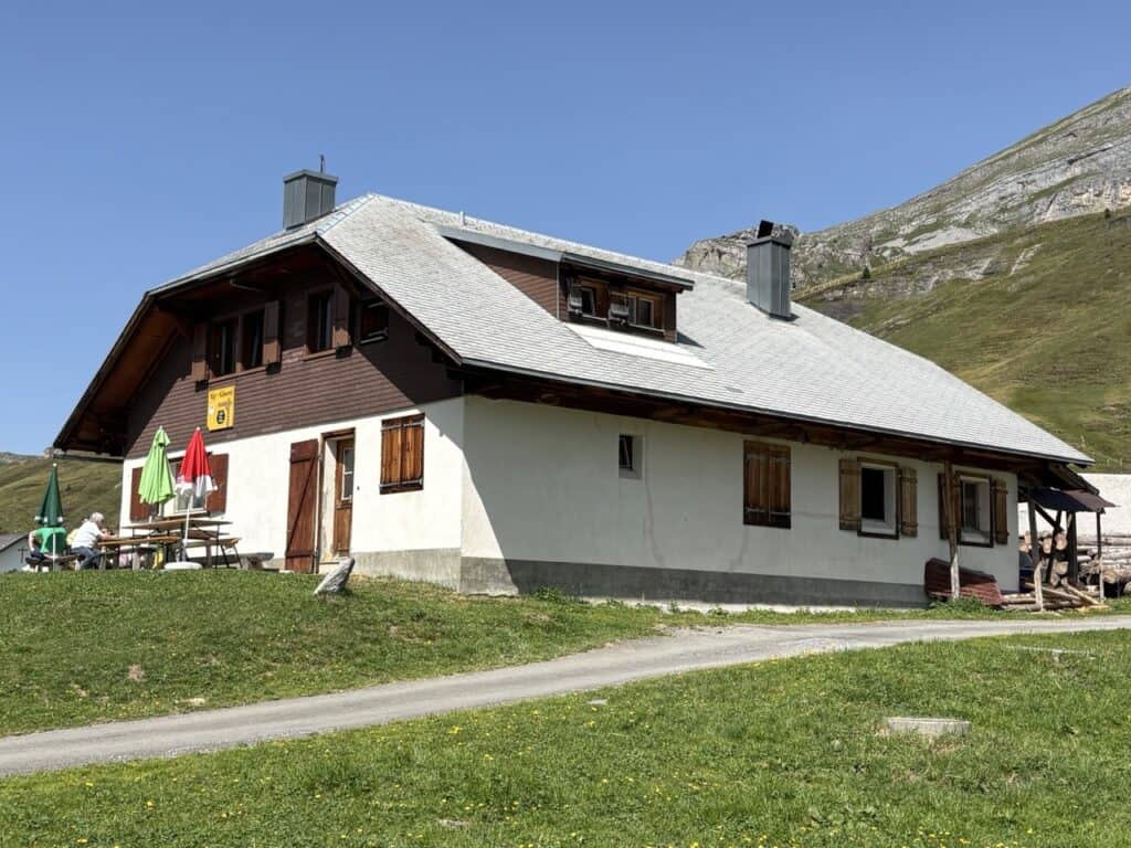 Traditional alpine cheese dairy at Tannalp, where local Swiss mountain cheese is produced along the Four Lakes Hike near Melchsee-Frutt.
